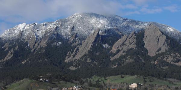CU Boulder campus with Flatiron mountains in the background