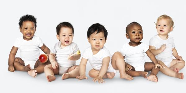 Five babies sitting