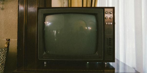 Analog TV in a retro 1970s style living room