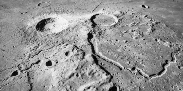 A winding valley on the surface of the moon