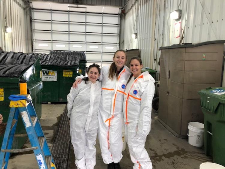 Students pose for photo during waste audit at Vail Resorts