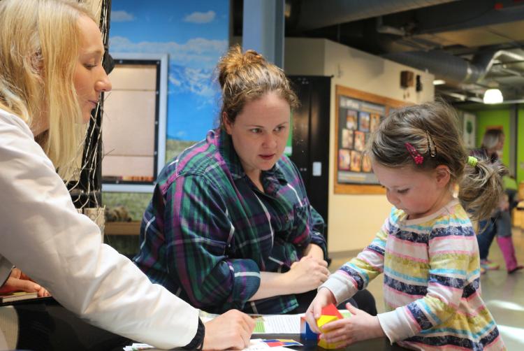 CU Boulder psychology student works with families at the Children's Museum in Denver last spring thanks to Outreach Award.