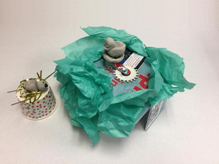 Paper robot created by student at Boulder Public Library makeathon