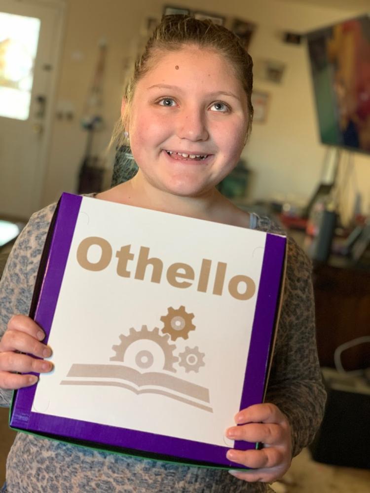 Isabelle Harris holds Othello game