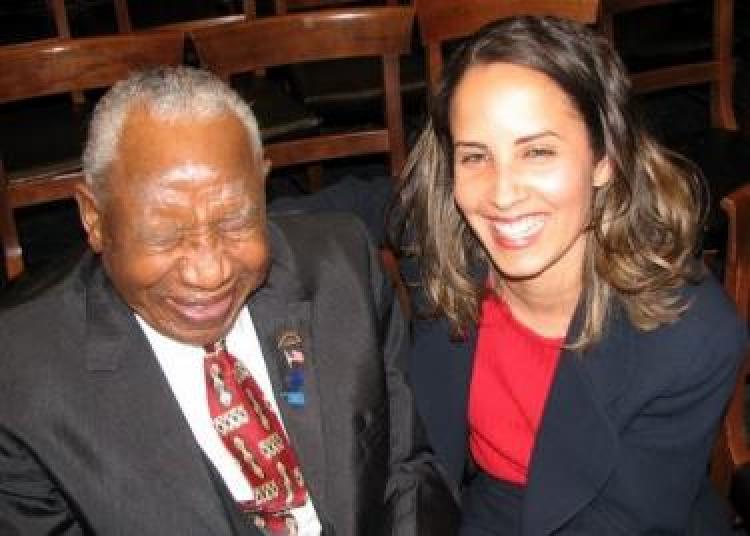 Professor Malveaux with Tulsa massacre survivor Otis Clark