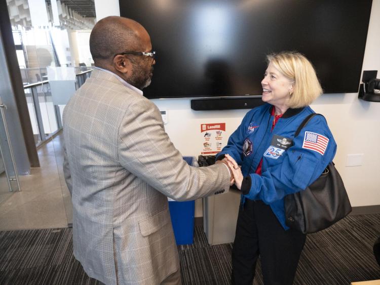 NASA's Pam Melroy shakes hands with Brian Argrow