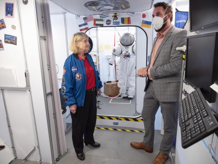 NASA's Pam Melroy and Smead Program Director Chris Muldrow in an aerospace engineering lab on campus