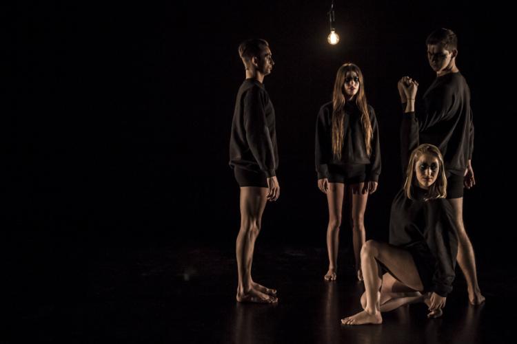 Students dressed in black for Open Space dance performance