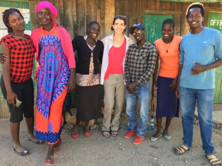 Posner poses with researchers who conducted a survey of Kenyans living in Isiolo County