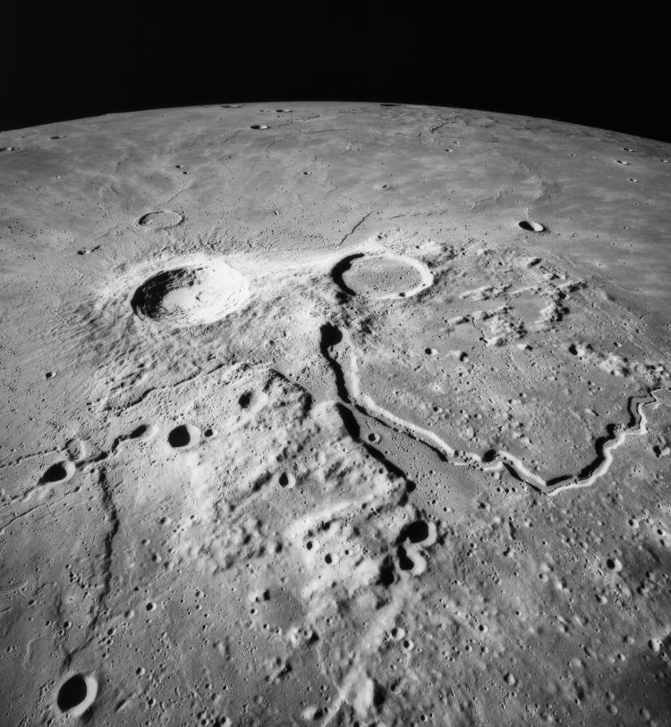 A winding valley on the surface of the moon