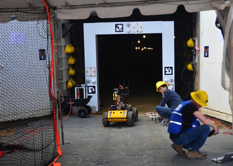 MARBLE team members ready a Husky robotic vehicle to enter Edgar mine.