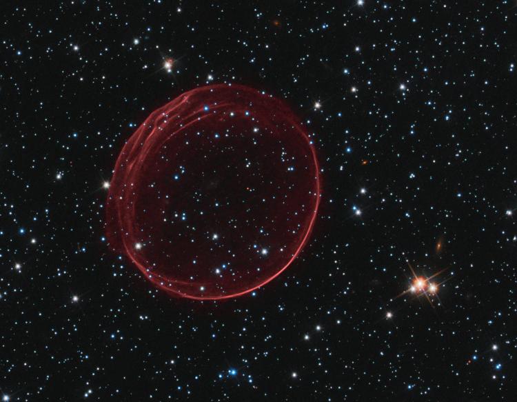 Bubble of expanding gas created by a supernova.