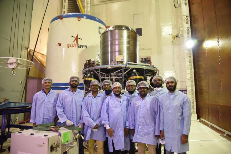 Engineers from ISRO and the Indian Institute for Space Science and Technology stand in front of the launch vehicle that will carry INSPIRESat-1 into space.