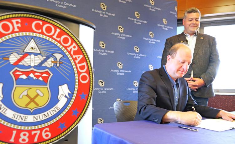 Gov. Jared Polis signs quantum industry bill on campus