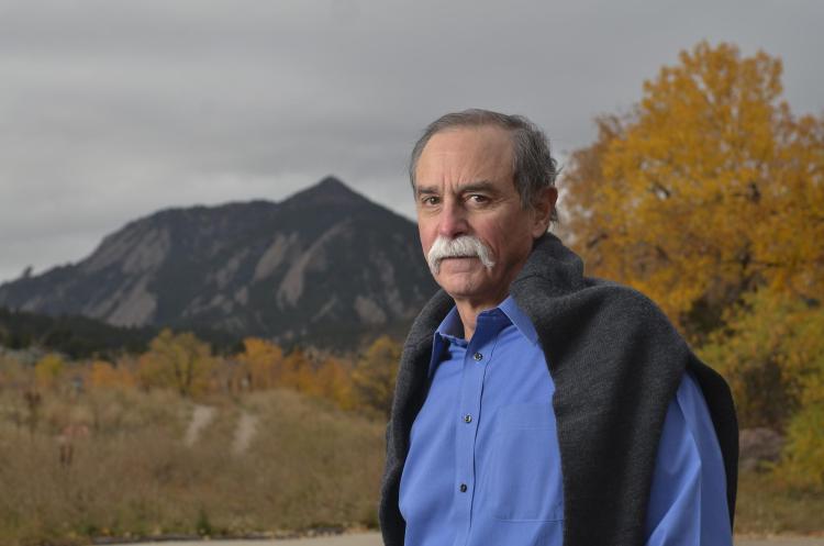 David Wineland with the Boulder Flatirons in the background