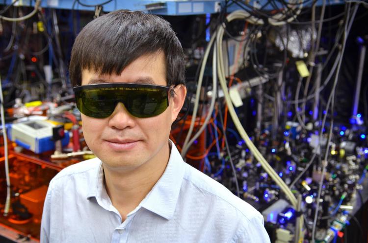 Jun Ye wearing safety goggles in his lab