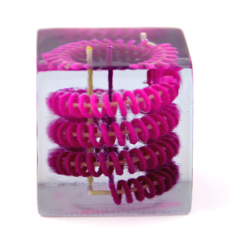 A spiral channel embedded in plastic