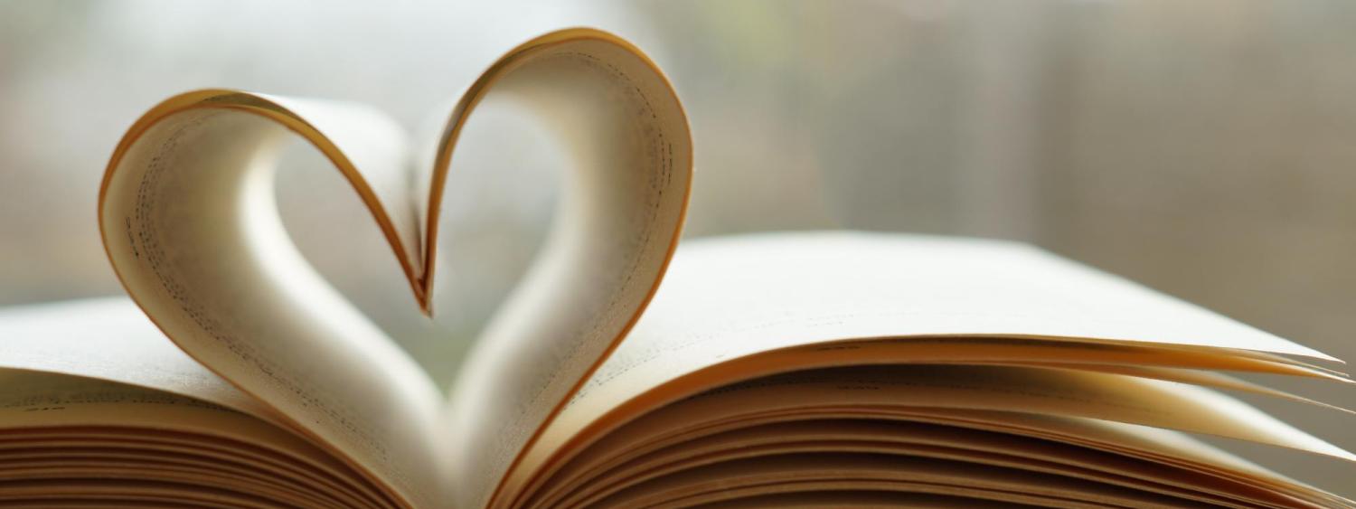 pages of a book shaped into a heart