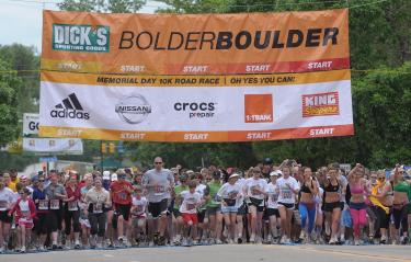 Runners, joggers and walkers bolt from the starting line of the 2009 Memorial Day Bolder Boulder race. (Photo by Casey A. Cass/University of Colorado)
