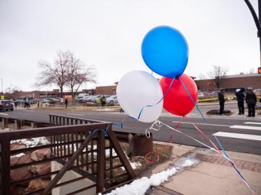 Red, white and blue balloons near the Table Mesa King Soopers
