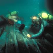 researchers scuba diving in the Mediterranean