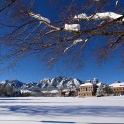 A view of the Flatirons from a quiet, snowy CU Boulder campus.