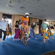 Nii Armah Sowah, center, leads a dance class