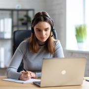 young person taking a webinar