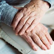 Stock photo of wrinkled hands.