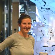 ATLAS doctoral student Lila Finch with Luminous Science project