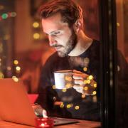 Man looking at screen at night