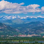 CU and city of Boulder with mountains in the background