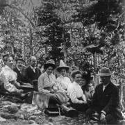 Dr. Francis Ramaley and Dr. Caldwell (right) with a class in the forest near the Mountain Research Station in 1909. Students are wearing formal field dress. 