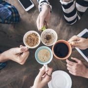 cheers with coffee cups