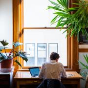 Faculty member working at a desk