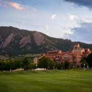 A scenic image of the Flatirons and Center For Community