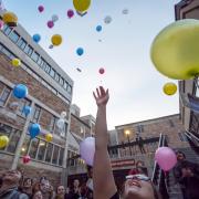 Students release biodegradable balloons as part of class project