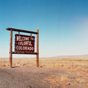 "Welcome to colorful Colorado" road sign