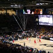 The CU men's basketball team plays an opponent at the CU Events Center.