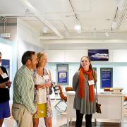 Visitors explore a CU Museum of Natural History exhibit