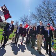 The 2022 Conference on World Affairs procession through international flags