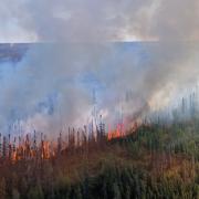 Smoke rising from an active fire in the Northwest Territories