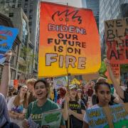 Young people demonstrate ahead of a climate summit in New York in September 2023