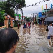 Floods that cuts the Raya Bintara Rd. in Jawa Barat, Indonesia on Jan. 1, 2020
