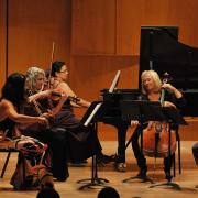 String orchestra performs in Grusin Hall