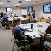 Employees engage in a workshop on campus