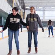 Students ice skating at the Rec Center on campus