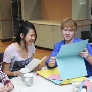 Students do crafts at International Coffee Hour