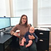 Kate Lanter and her son in her home office