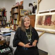 Photo of printmaker Melanie Yazzie in her studio